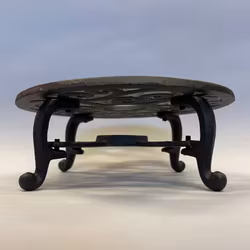 Grytunderlägg för värmeljus i järn