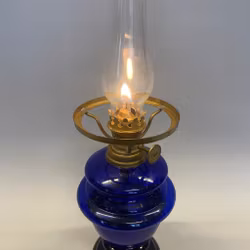 Minifotogenlampa i kungsblått glas med mini-vestaskärm