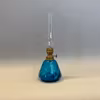 liten turkos fotogenlampa