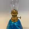liten turkos fotogenlampa