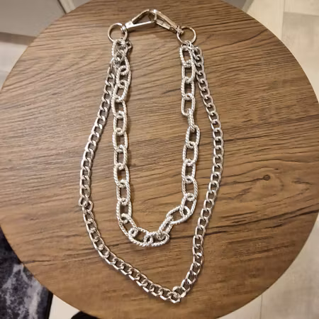 Dubbel byxkedja i silverfärg