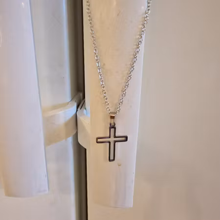 Halsband hålkorsberlock