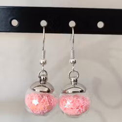 Örhängen glasglob med rosa stjärnglitter