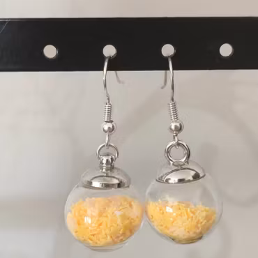 Örhängen glasglob med gul stjärnglitter