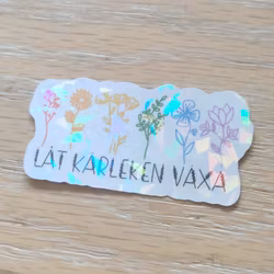 Klistermärke låt kärleken växa stor
