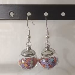 Örhängen glasglob med mix orange, lila och rött stjärnglitter