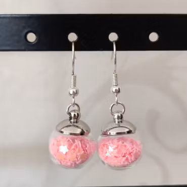 Örhängen glasglob med rosa stjärnglitter
