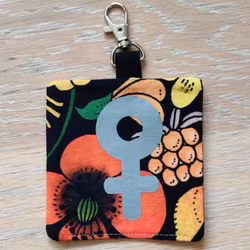 Reflex kvinnosymbol på orange blommigt nr.3