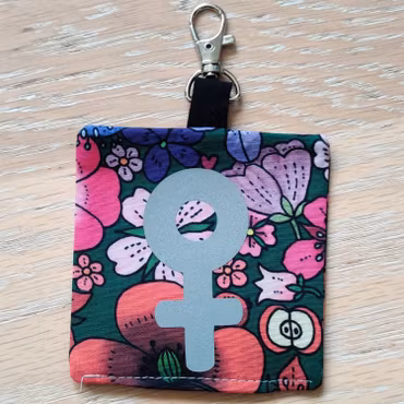 Reflex kvinnosymbol på rosa och rött blommigt nr.27