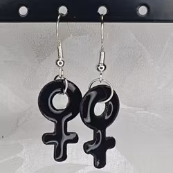 Örhängen med små kvinnosymboler i black