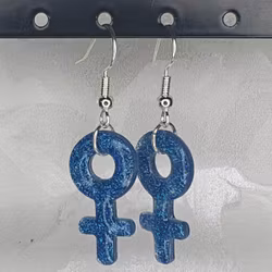 Örhängen med små kvinnosymboler med glitter blå