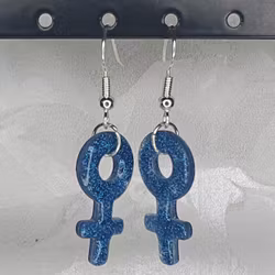 Örhängen med små kvinnosymboler med glitter blå