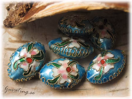 Cloisonne metallic blå puffad ellips ca 20x14 mm