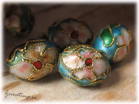 Cloisonne pärla metallic ljusblå oval ca 11x9 mm