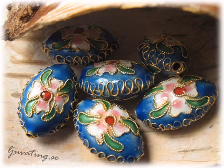 Cloisonne klarblå puffad ellips ca 20x14 mm