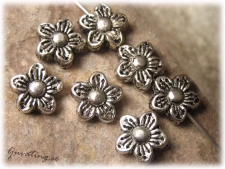 Mellandel blomma i tibetsilver 20-pack ca 9 mm