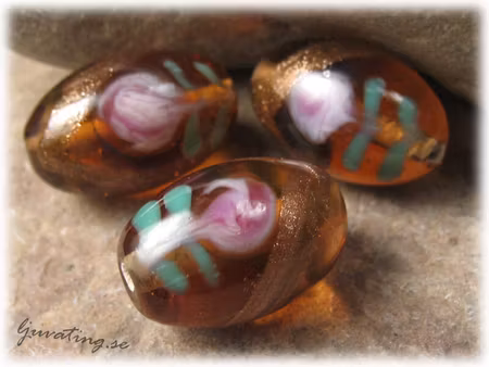 Topaz oval med ros o blad ca 20x13 mm