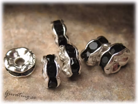 Silvrig rondell med svart Rhinestone ca 6 mm