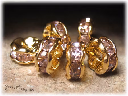 Guldig rondell med rosa Rhinestone ca 6 mm
