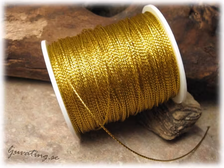 Runt guldband ca 0,8 mm tjock