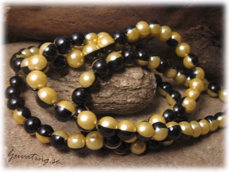 Glaspärla rund svart/marsangul 20-pack ca 8 mm