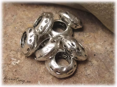Mellandel ring ufo med större hål 20-pack ca 11x5 mm