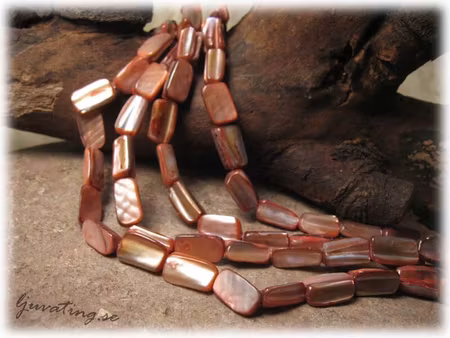 Snäckskalspärlor laxfärgade ca 15x8 mm