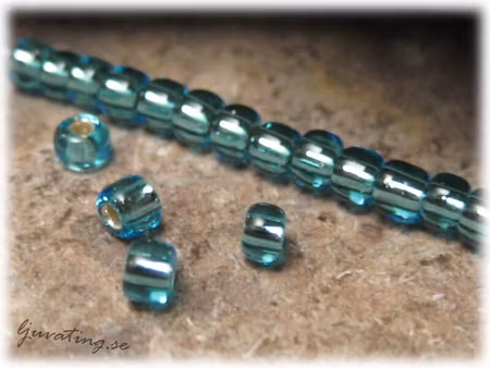 Matsuno medium aqua silverlined 11/0