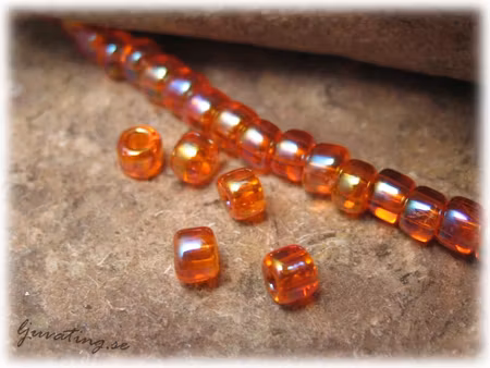 Matsuno mörk orange transparent Rainbow 11/0