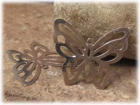 Silhuett fjäril silverpläterad ca 20x17 mm