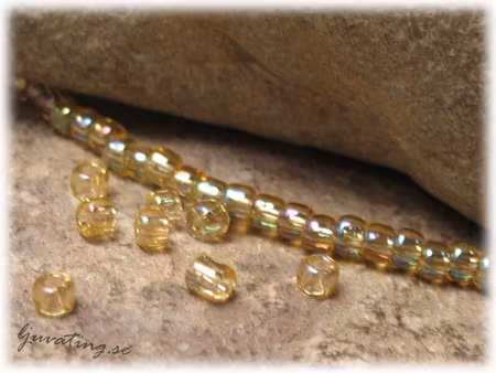 Matsuno light topaz transparent Rainbow 11/0