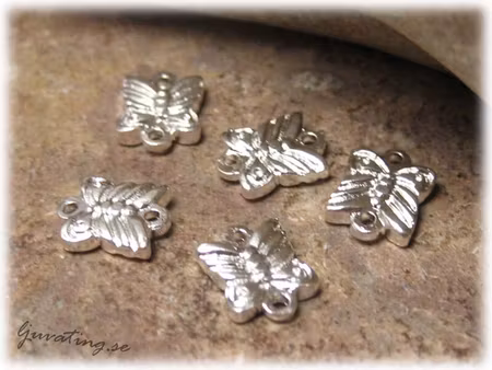 Connector fjäril silverplätterad 8-pack ca 8x6 mm
