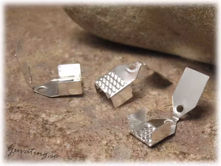 Silverfärgade avslut 10-Pack ca 11x7 mm