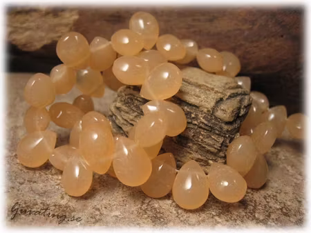 Ljus opak orange droppe glaspärla 10-pack ca11x8mm