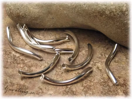 Kurviga silverfärgade rör 20-pack ca 23-27x2 mm