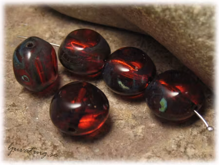 Brunröd transparent glaspärla ca 12x12x8 mm