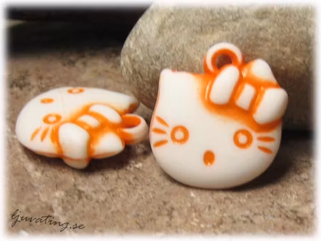 Berlock orange Hello Kitty ca 20x20 mm