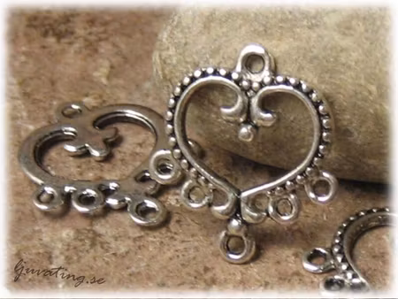 Connector i metall med öglor ca 21x19 mm