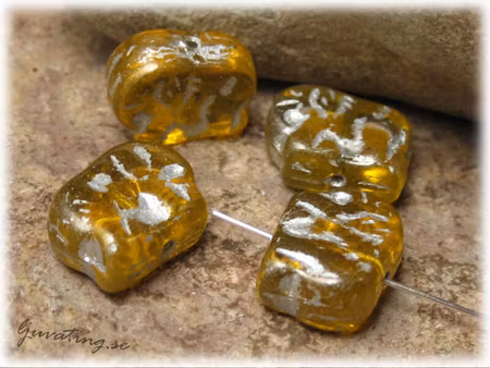 Limegul elefant med silverinlägg ca 13x10 mm