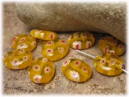 Basfärg gul flat oval millefiori ca 12x10 mm