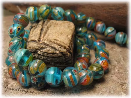 Millefiori glaspärla basfärg turkosgrön rund ca 8 mm