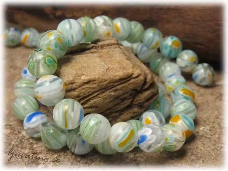 Millefiori glaspärla basfärg blågrön rund ca 8 mm