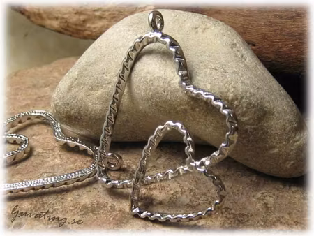 Stort dubbelhjärta på sne ca 40x50 mm