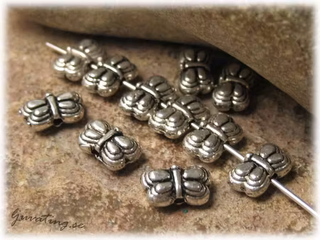 Berlock fjäril mellandel i tibetsilver 30-pack ca 8x5 mm