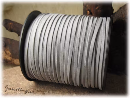 Fuskmocka grått bredd ca 3 mm