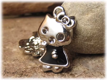 Berlock hello kitty med svart klänning ca 23x13 mm