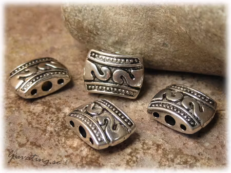 Avdelare 3-hålsdelare med motiv ca 11x8 mm