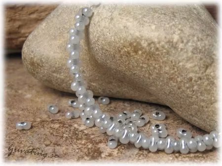 Ceylon grey farfalle pärla ca 4x2 mm