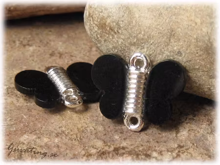 Connector svart/silver fjäril ca 18x15 mm