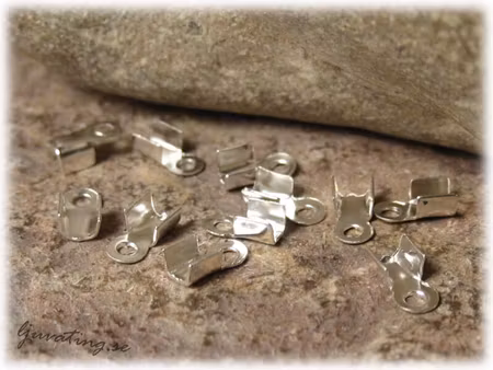 Riktigt små silvriga avslut 10-Pack ca 5x3 mm